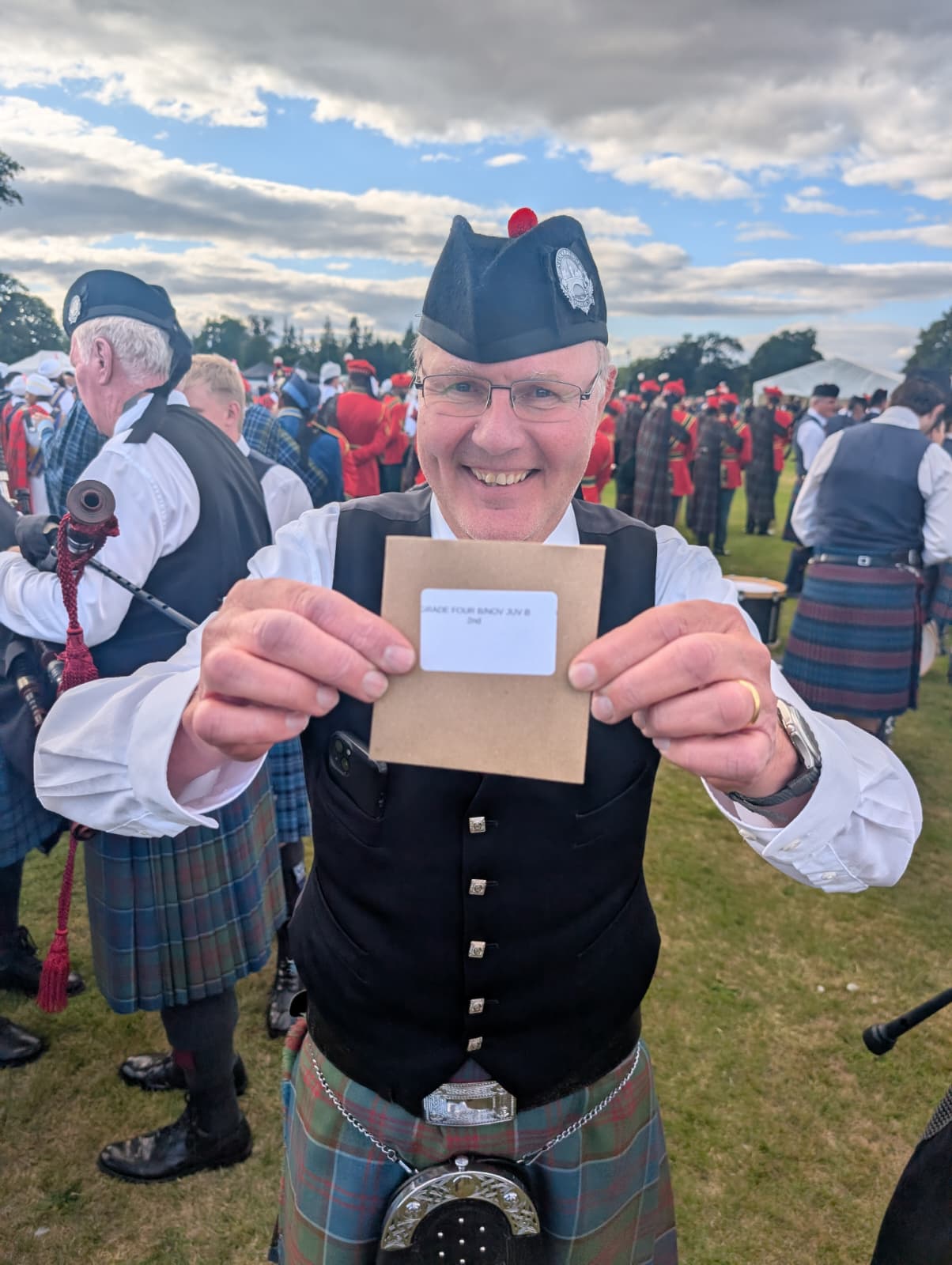 Stockbridge Pipe Band marching in the Perth Highland Games March Past 2026